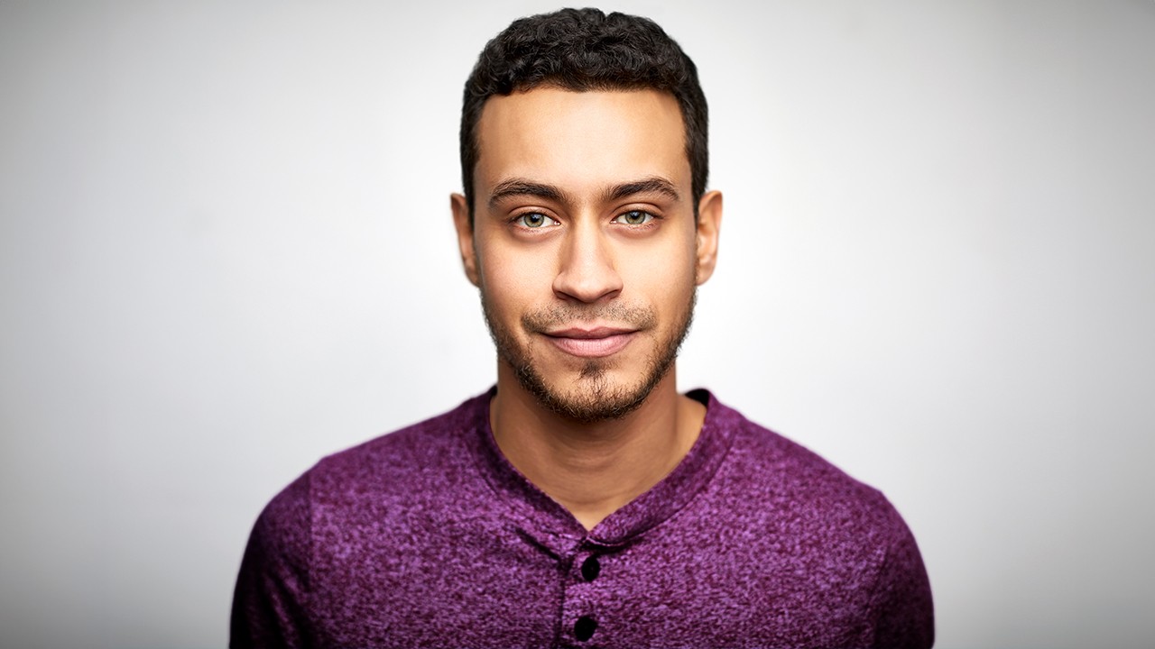 Man in purple shirt