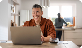 Patient using a tablet at home for a virtual follow-up with a healthcare provider.