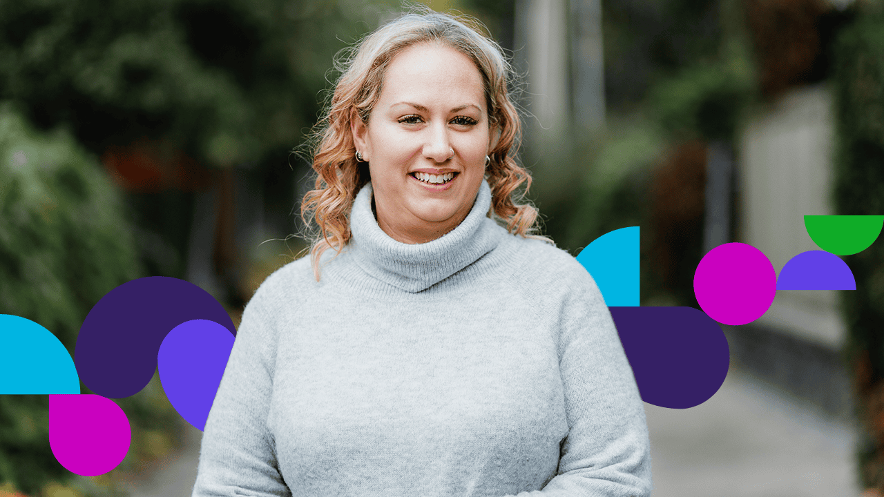 Woman outside wearing turtleneck sweater