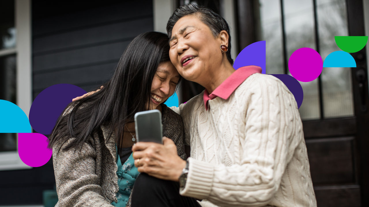 An older and a younger person laughing together on a porch, with colorful abstract shapes overlaid.