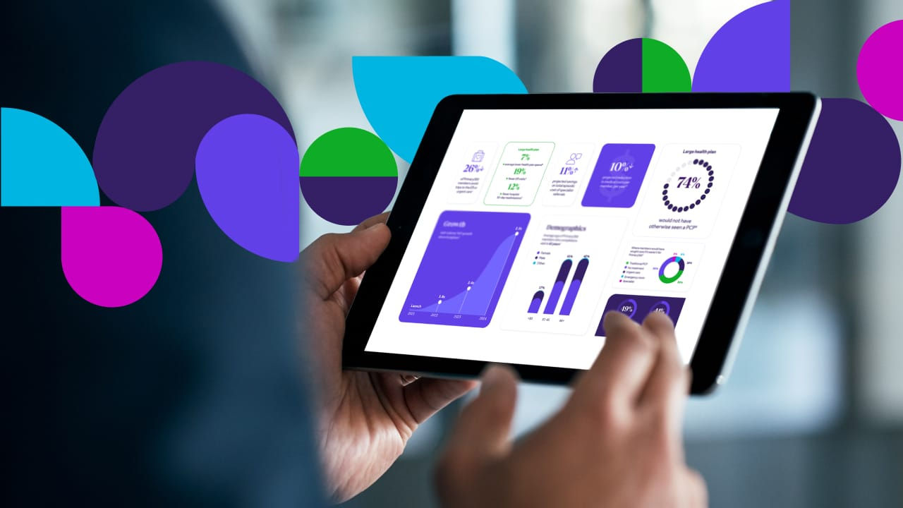 Person holding tablet showing statistics with colorful graphics in the background