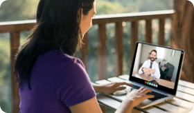 Doctor meeting remotely with his patient