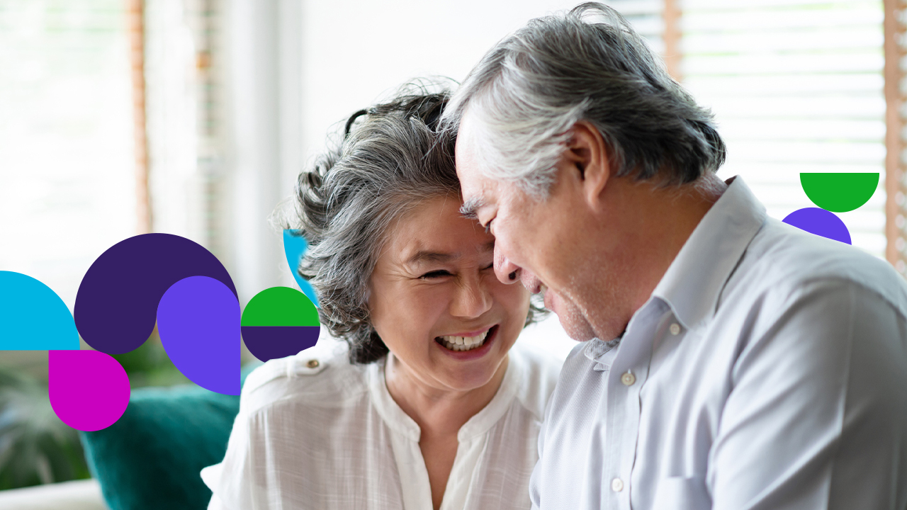 Senior couple looking at each other and smiling