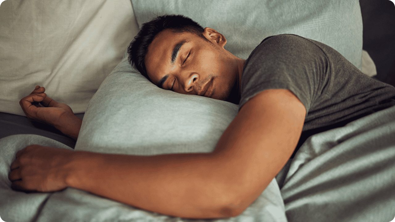 Man in bed sleeping