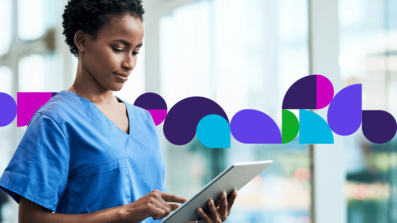 Medical professional looking at tablet