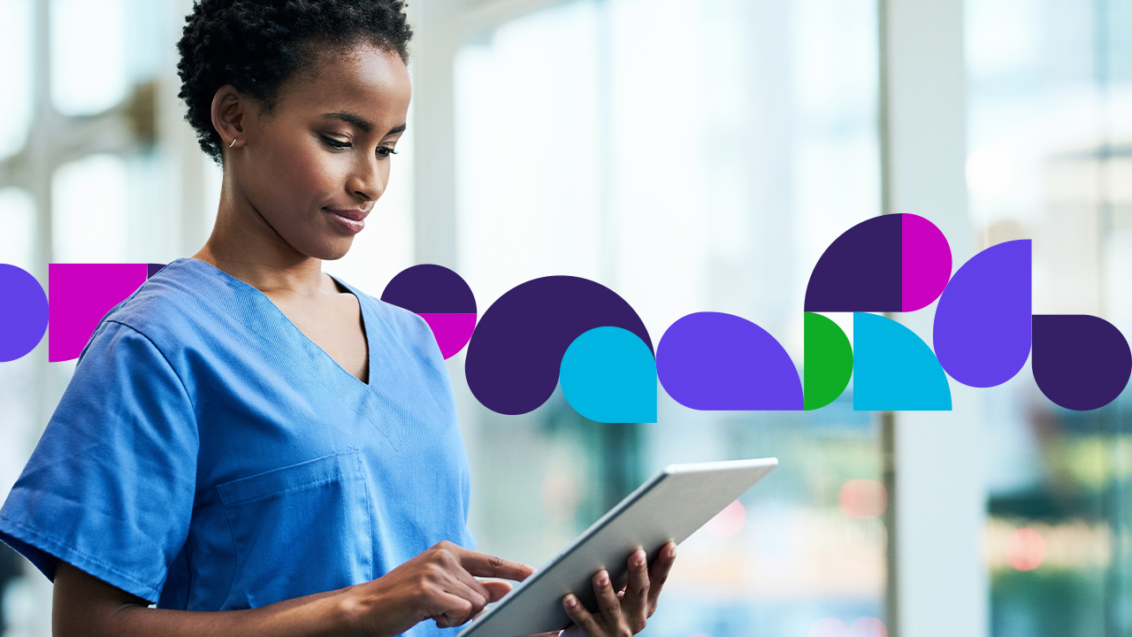 Medical professional looking at tablet