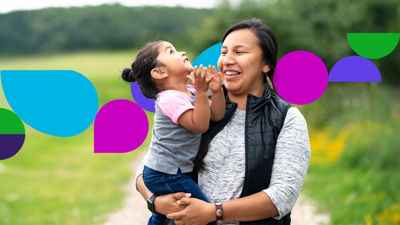 Woman holding child