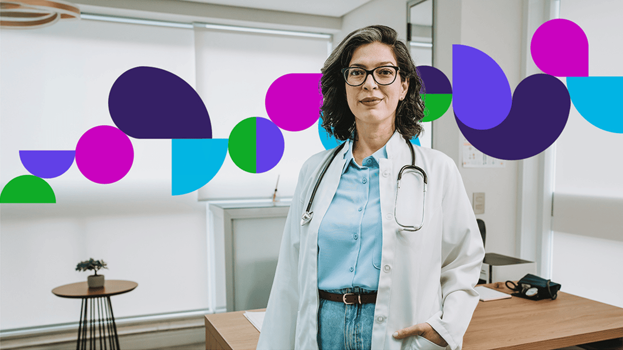A doctor standing in a well lit office