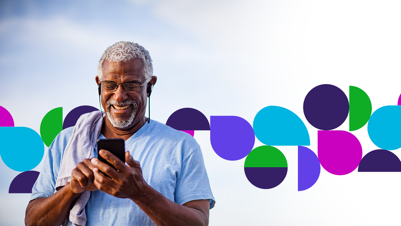  Senior man looking at his phone