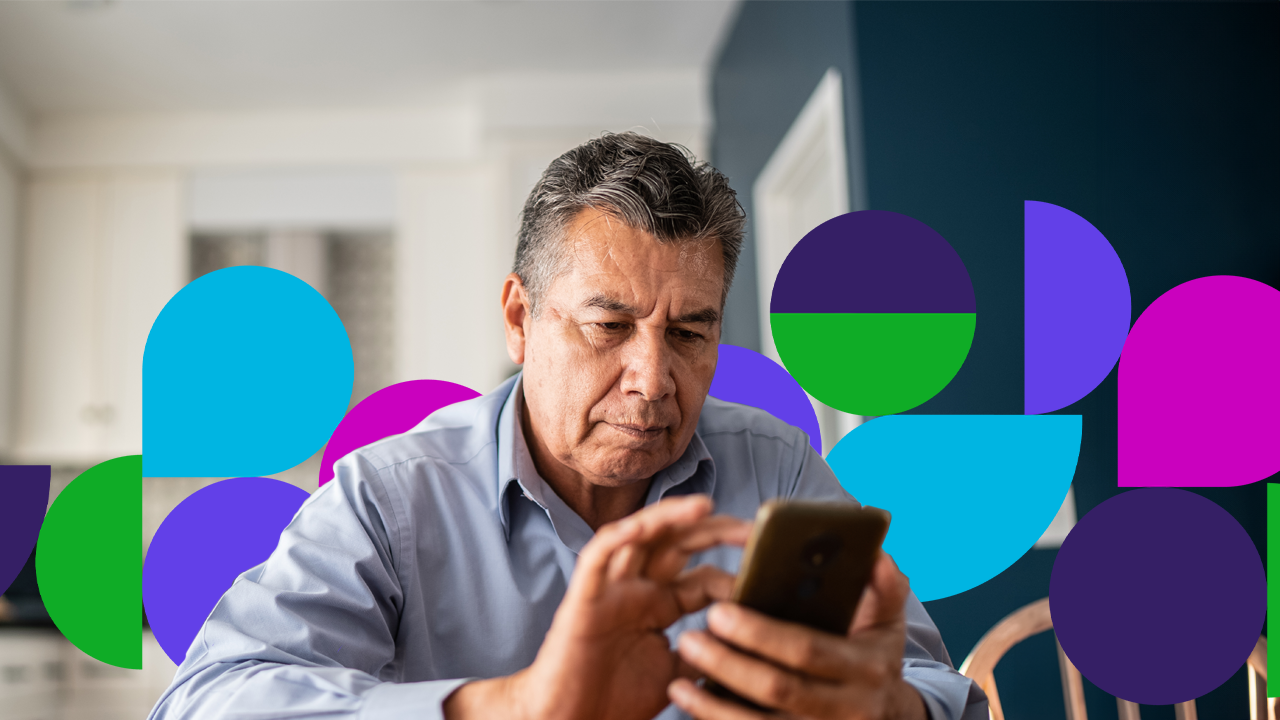 Senior man looking cell phone