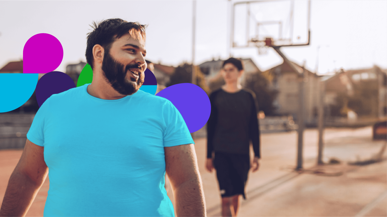 Man on an outside basketball court