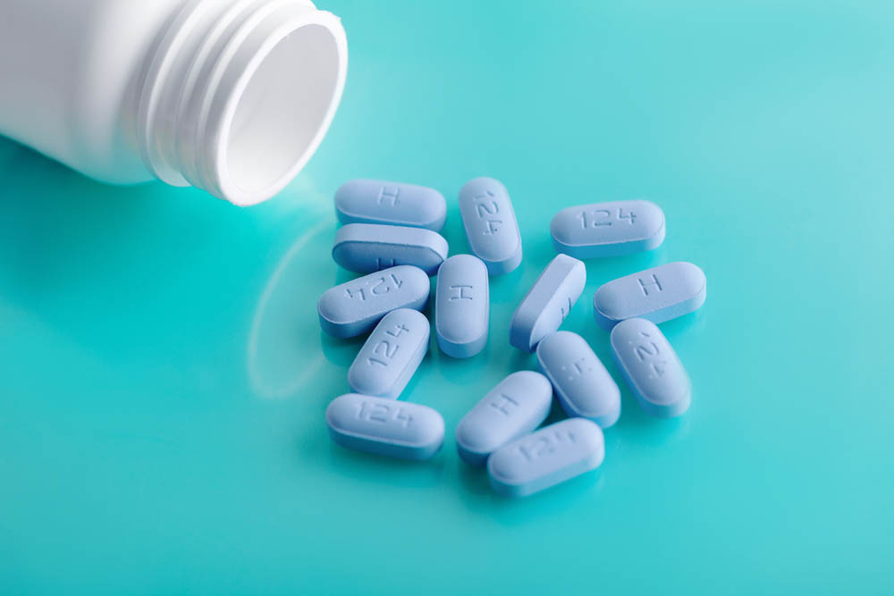 Open bottle of prescription PrEP Pills for Pre-Exposure Prophylaxis to help protect people from HIV. 