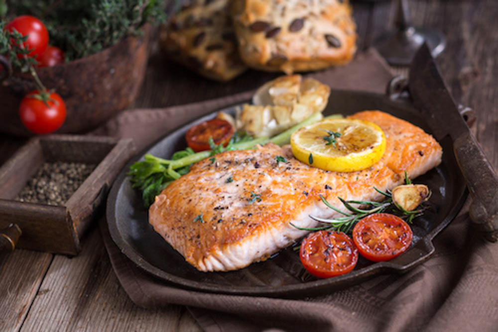 Fillet of salmon with vegetable.